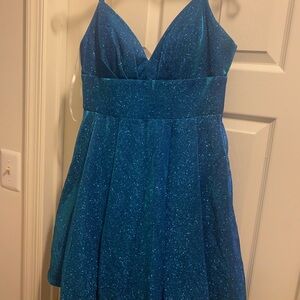 Blue sparkle dress
Smoke free home 
Women’s size 11/12